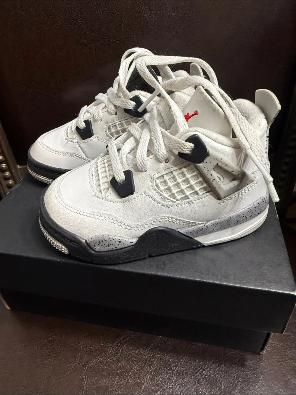 Nike Kids White Sneakers with Black Soles and Red Jumpman
